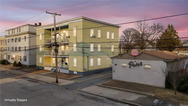 view of property at dusk