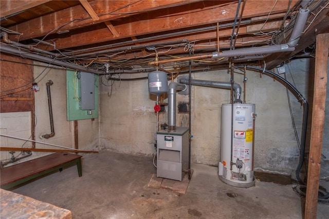 unfinished below grade area featuring electric panel and water heater