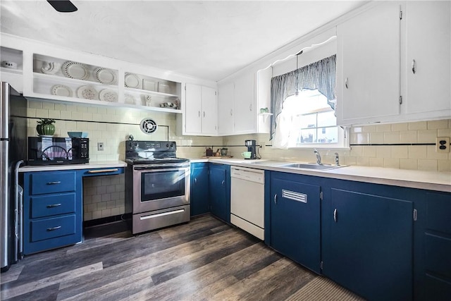 kitchen with stainless steel electric range oven, blue cabinetry, open shelves, white dishwasher, and a sink