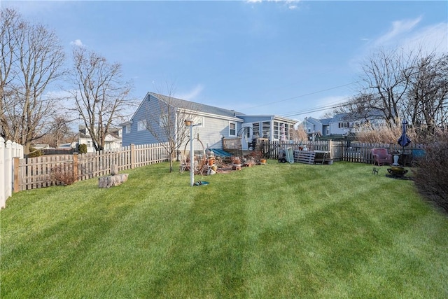 view of yard featuring a fenced backyard