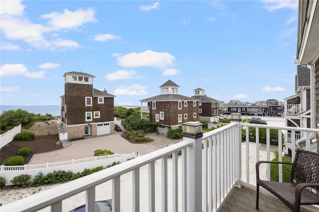 balcony featuring a water view