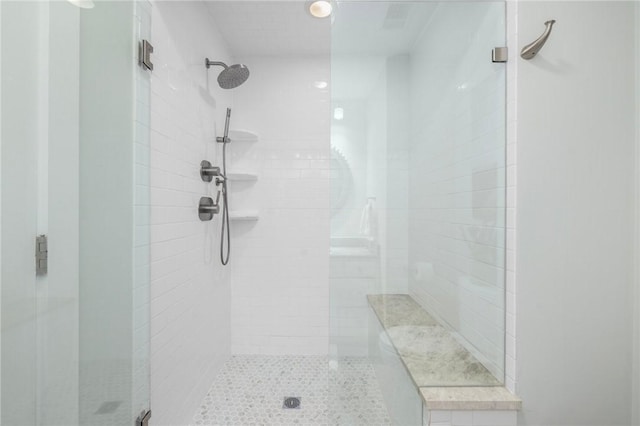 full bathroom featuring a shower stall