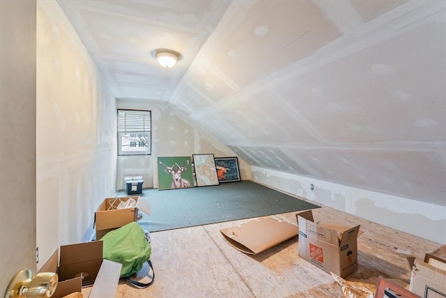 bonus room with vaulted ceiling