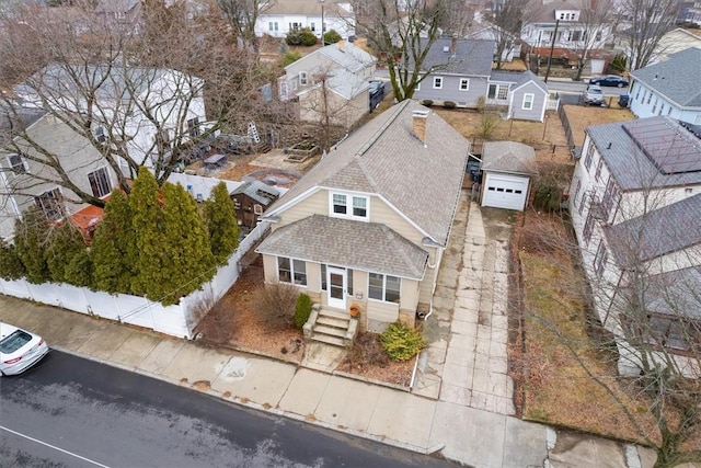 birds eye view of property with a residential view