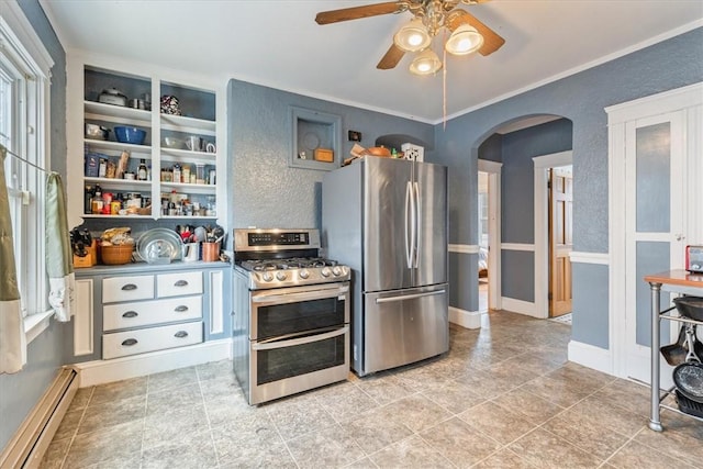 kitchen with arched walkways, a textured wall, ornamental molding, stainless steel appliances, and a baseboard heating unit