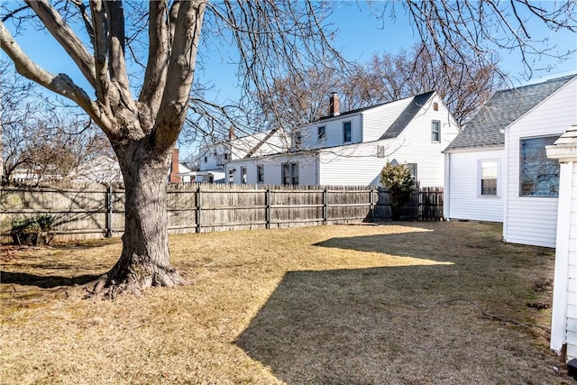 view of yard with a fenced backyard