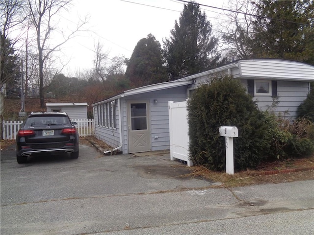 view of front of house with fence