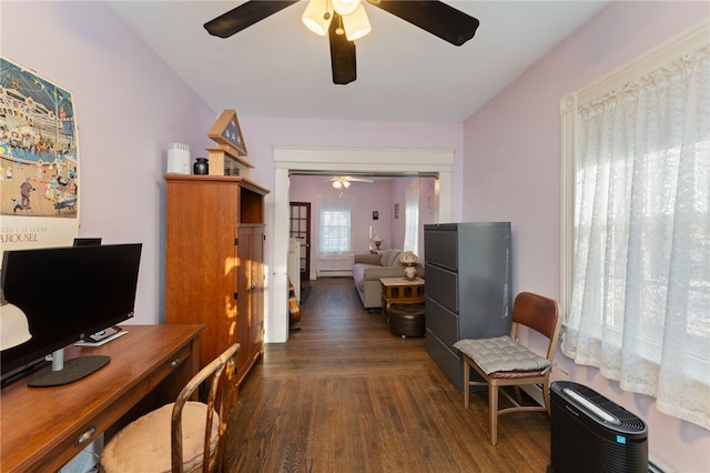 office area with a ceiling fan and wood finished floors