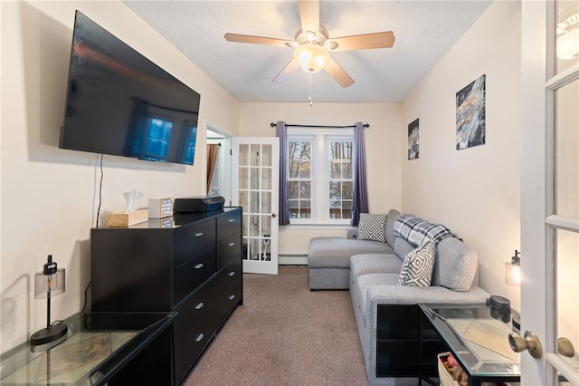 carpeted living room featuring a baseboard heating unit, french doors, a textured ceiling, and a ceiling fan