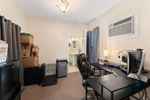 carpeted home office with an AC wall unit and a sink