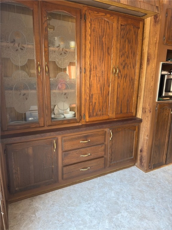 interior details featuring stainless steel microwave