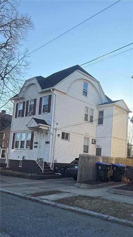 view of front of home with fence