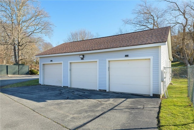 detached garage with fence