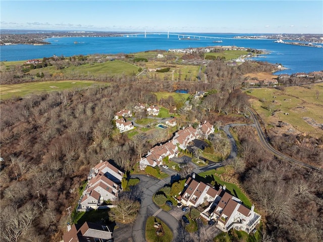 bird's eye view with a water view and a residential view