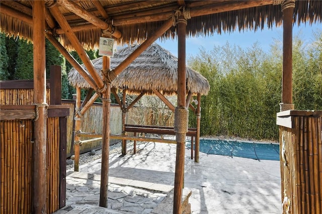 view of swimming pool featuring a gazebo