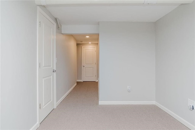 spare room with carpet flooring, recessed lighting, and baseboards