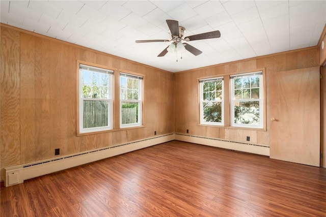 277 Waterman St, Providence, RI 02906 - spare room with wood finished floors, wood walls, a ceiling fan, and a wealth of natural light