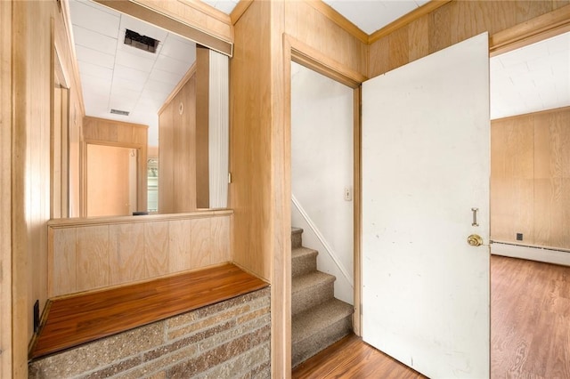 277 Waterman St, Providence, RI 02906 - staircase with a baseboard radiator, wood finished floors, and visible vents