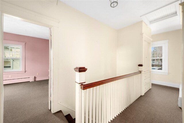 277 Waterman St, Providence, RI 02906 - hall with carpet flooring, a baseboard heating unit, an upstairs landing, and a healthy amount of sunlight