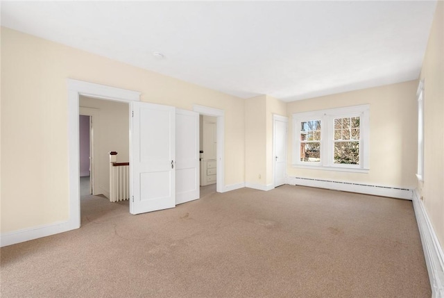 277 Waterman St, Providence, RI 02906 - carpeted empty room featuring baseboard heating and baseboards