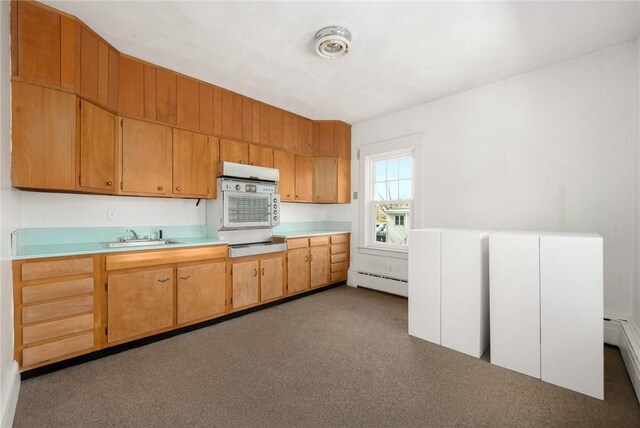 277 Waterman St, Providence, RI 02906 - kitchen featuring a sink, light countertops, and a baseboard heating unit