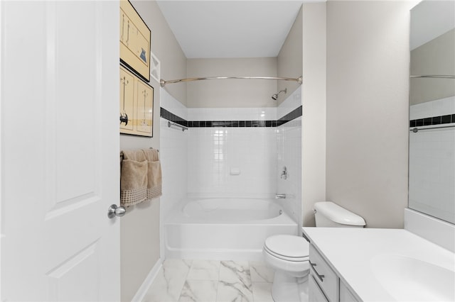 bathroom with toilet, vanity, marble finish floor, and bathtub / shower combination