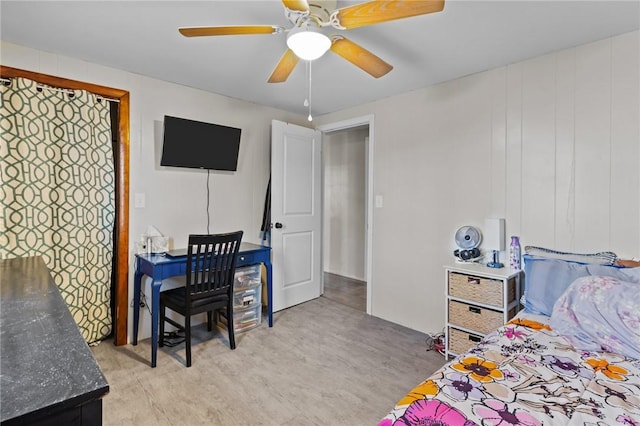 bedroom featuring light wood-style floors and ceiling fan