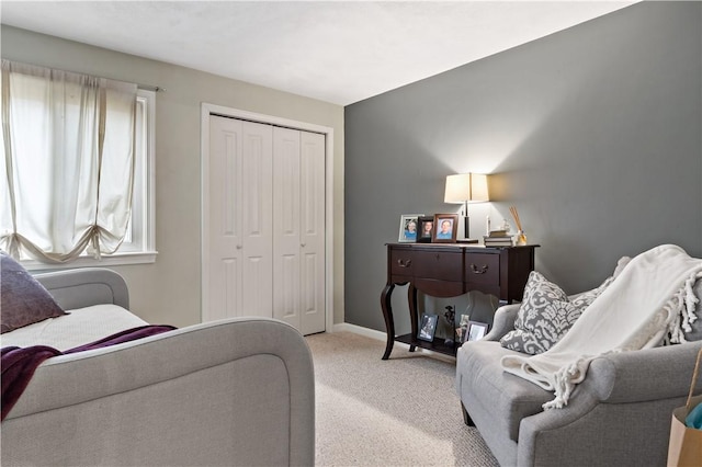 living room featuring light carpet and baseboards