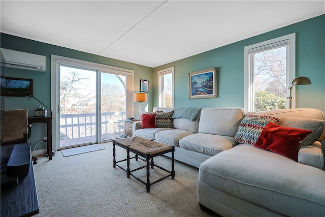 living area with an AC wall unit and carpet floors