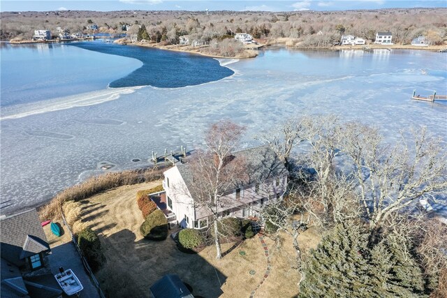 bird's eye view with a water view