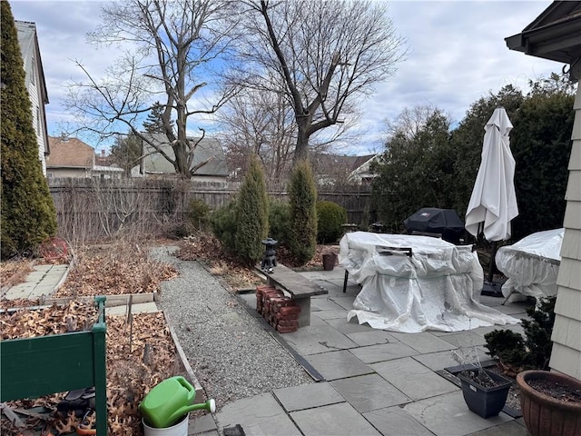 exterior space featuring a fenced backyard