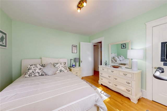 bedroom featuring light wood-type flooring