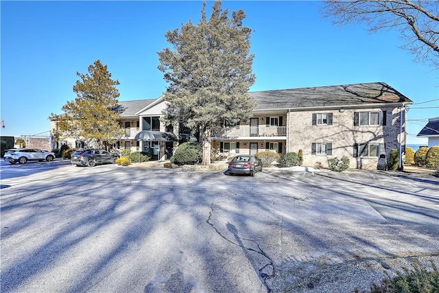 view of front of property with uncovered parking