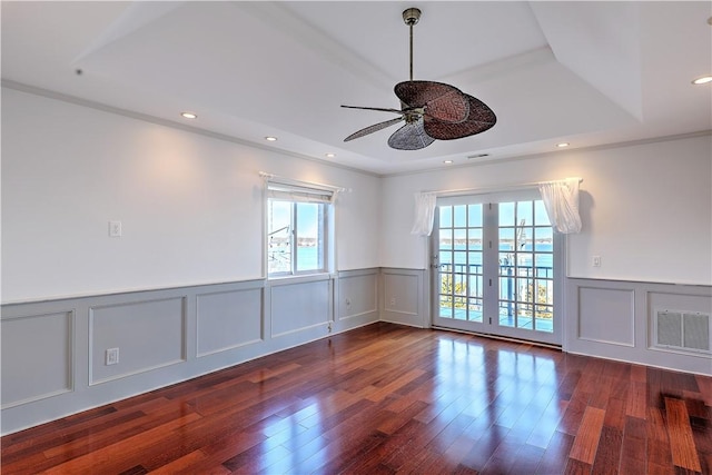 unfurnished room featuring recessed lighting, visible vents, wood finished floors, and a ceiling fan