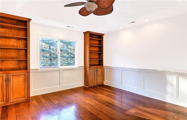 empty room with recessed lighting, visible vents, dark wood-style flooring, and ceiling fan