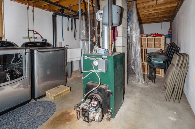 unfinished basement featuring independent washer and dryer and a heating unit