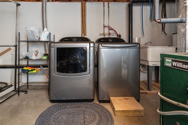 washroom with washer and dryer and laundry area