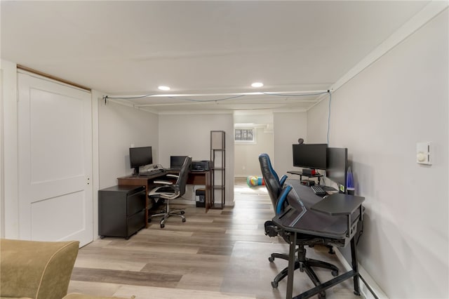 office area featuring recessed lighting, baseboards, and light wood-style floors