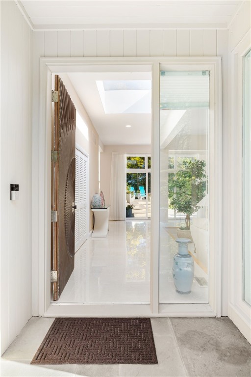 doorway featuring a skylight