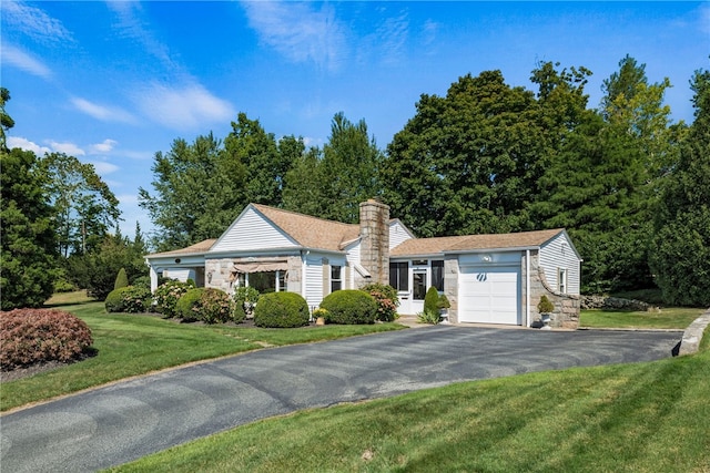 view of front of house with a front yard, a chimney, a garage, stone siding, and driveway