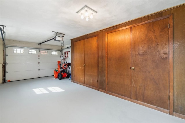 garage featuring a garage door opener