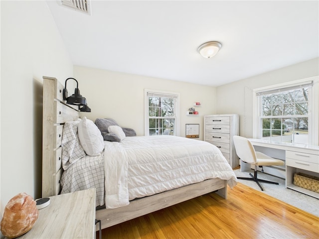 bedroom with visible vents