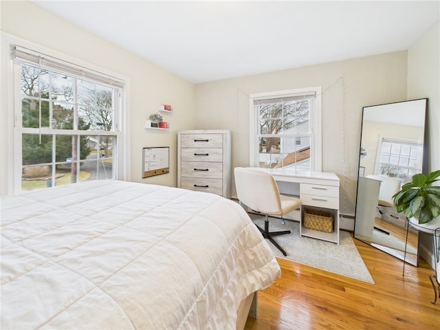 bedroom featuring wood finished floors