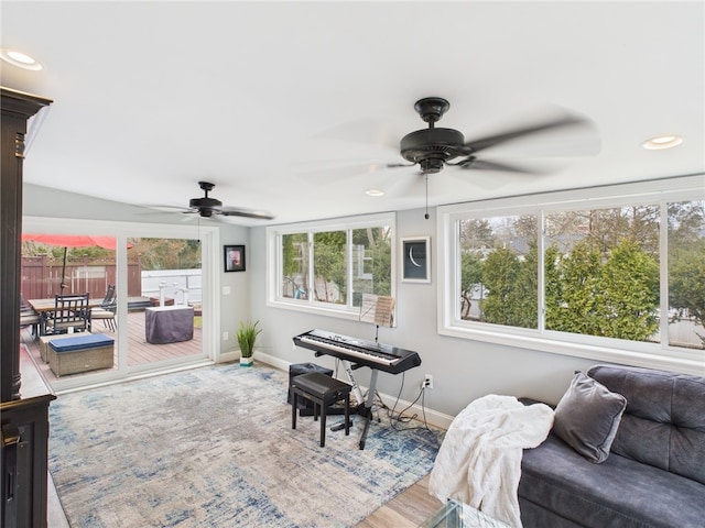 interior space with plenty of natural light and a ceiling fan