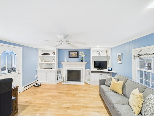 living room featuring a fireplace with flush hearth, light wood-style flooring, ornamental molding, built in features, and baseboard heating