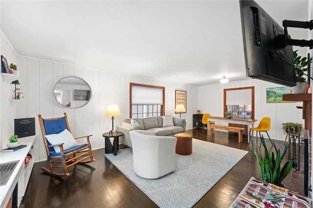 living area with dark wood-style flooring