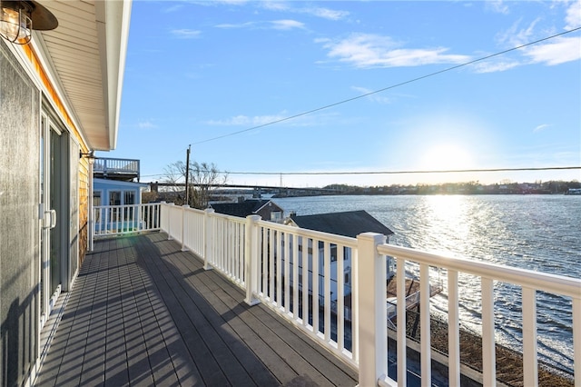 deck featuring a water view