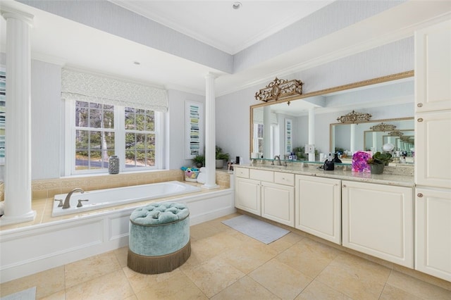 full bathroom with a garden tub, ornamental molding, tile patterned flooring, decorative columns, and vanity