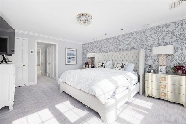 bedroom with wood finished floors, baseboards, visible vents, wallpapered walls, and crown molding