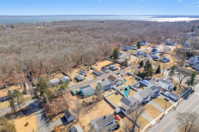 aerial view featuring a residential view and a view of trees